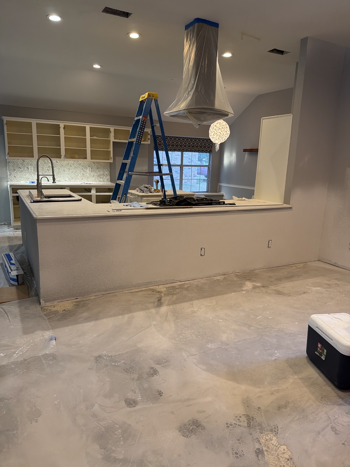 Wide view of the 5309 Meadow Chase kitchen and active renovation area